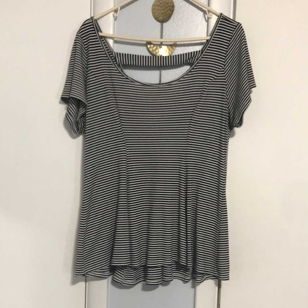 Torrid size 1 - kind of peplum top with cut out back detail